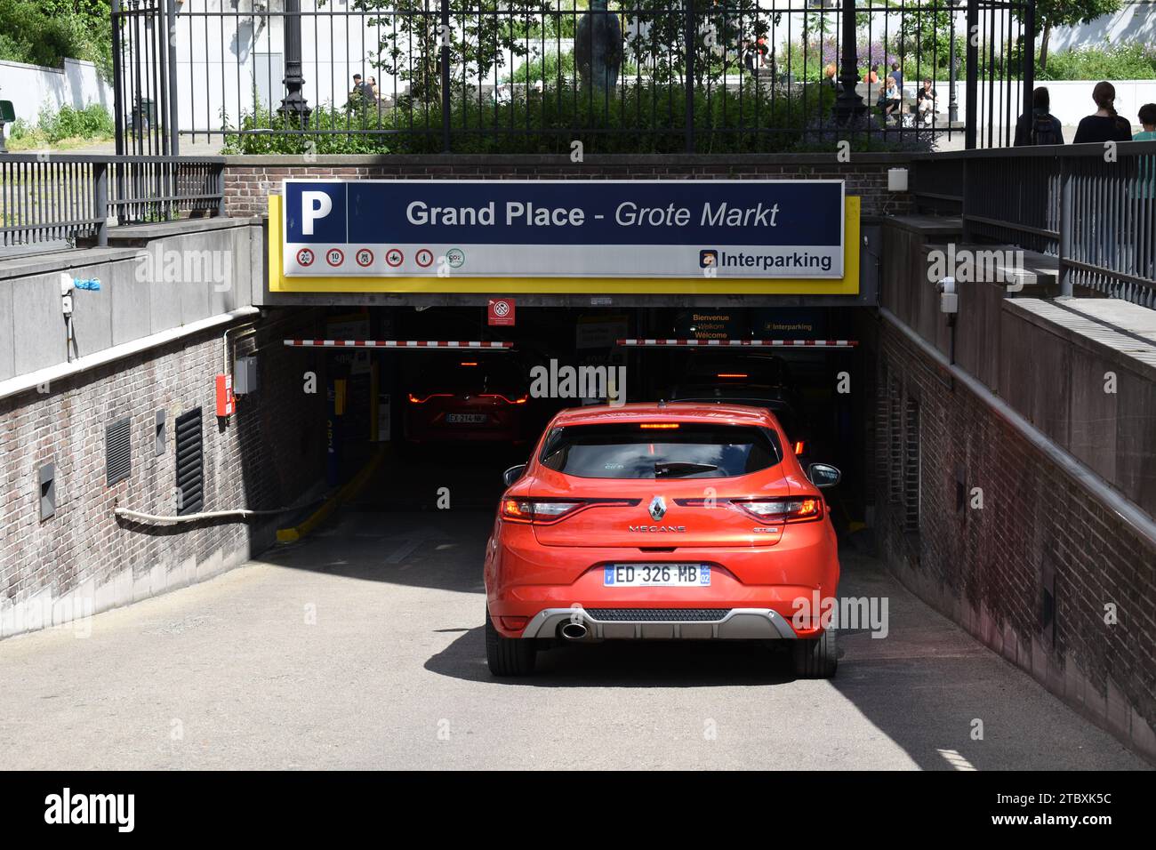 Cars entering the Grand Place parking in the centre of Brussels Stock ...