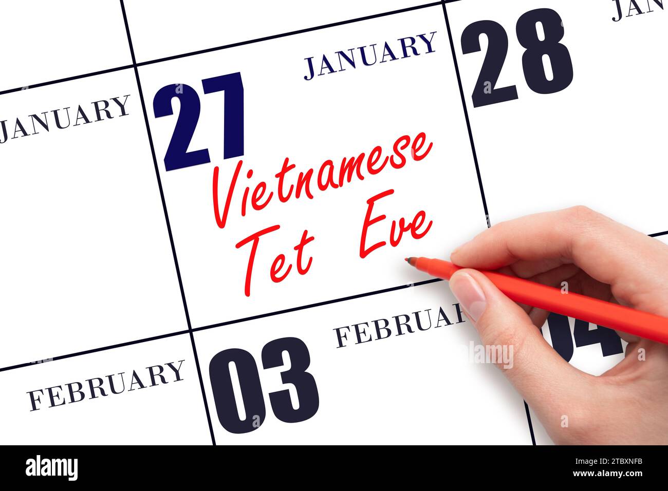 January 27. Hand writing text Vietnamese Tet Eve on calendar date. Save the date. Holiday. Day of the year concept. Stock Photo
