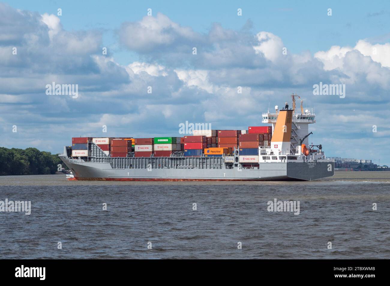 The Thetis D (IMO 9372274) a container ship on the River Elbe viewed
