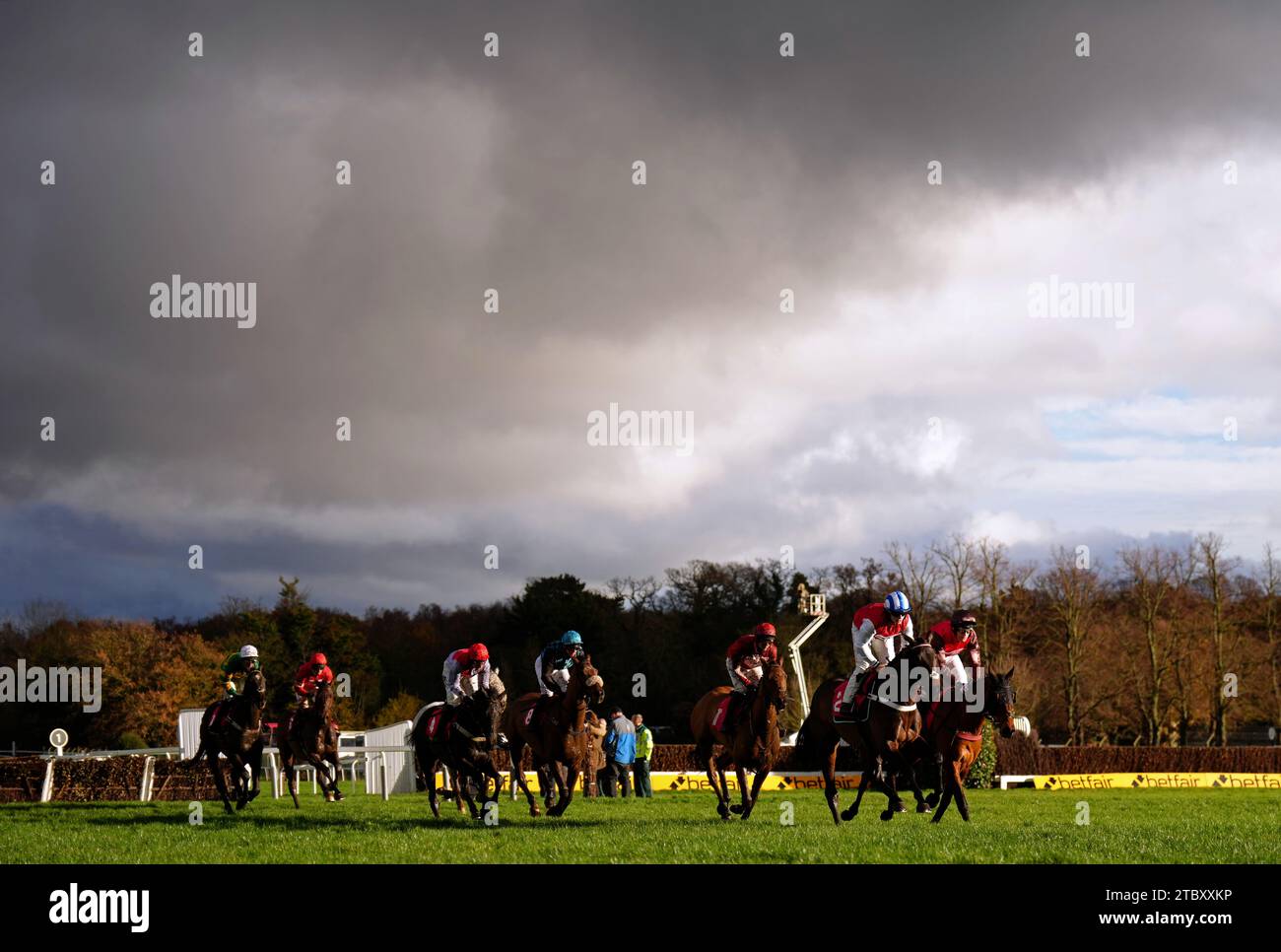 Runners and riders in action as they compete in the Pertemps Network