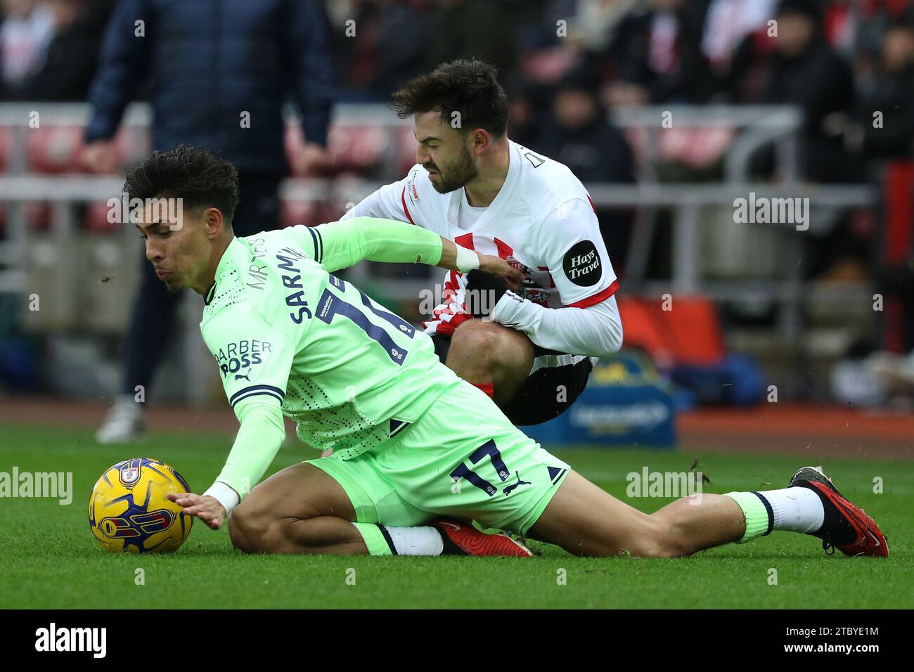 Sunderland, UK. 9th Dec 2023. Jeremy Sarmiento of West Bromwich Albion is challenged by Patrick Roberts of Sunderland during the Sky Bet Championship match between Sunderland and West Bromwich Albion at the Stadium Of Light, Sunderland on Saturday 9th December 2023. (Photo: Robert Smith | MI News) Credit: MI News & Sport /Alamy Live News Stock Photo