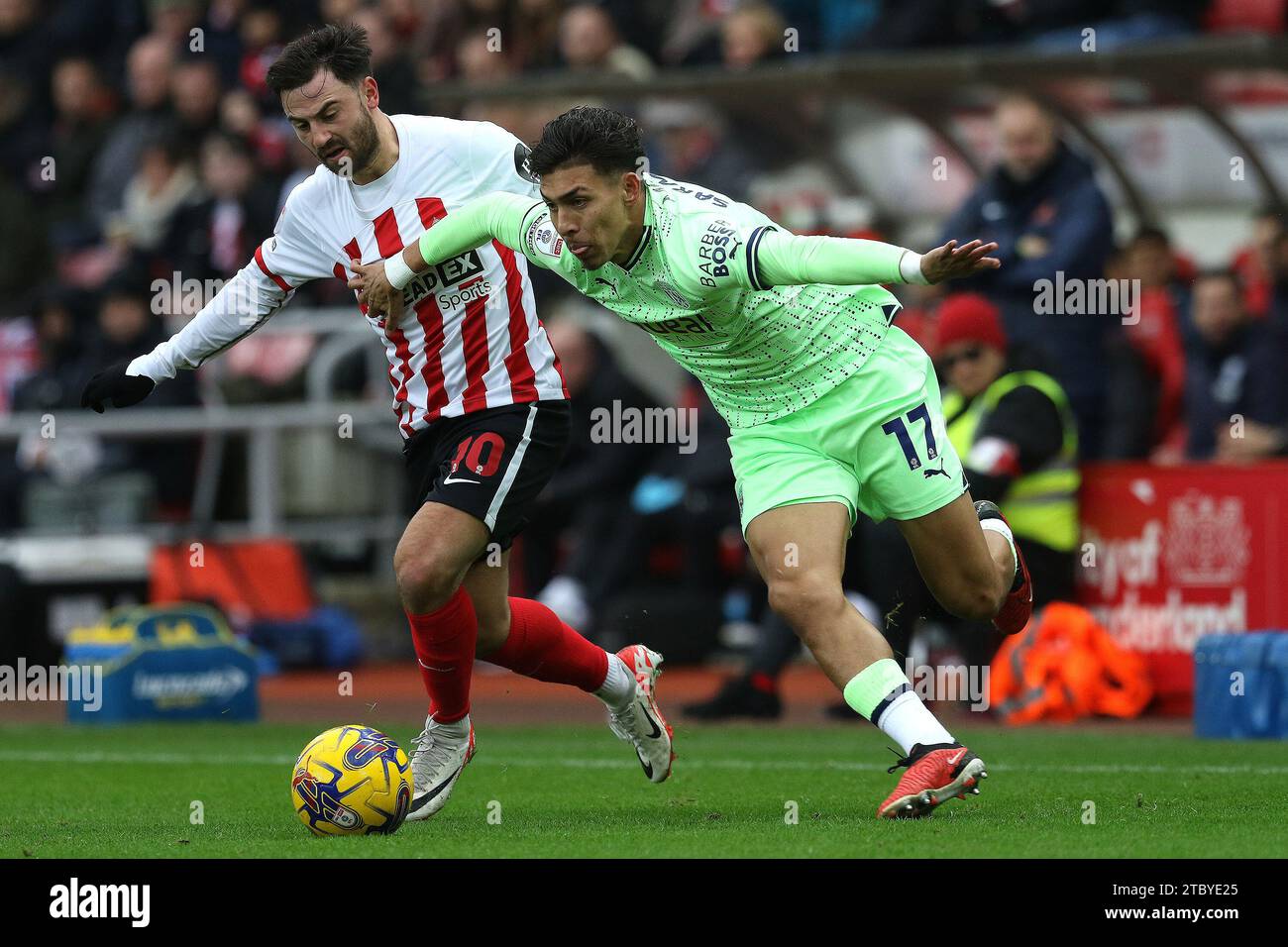 Sunderland, UK. 9th Dec 2023. Jeremy Sarmiento of West Bromwich Albion is challenged by Patrick Roberts of Sunderland during the Sky Bet Championship match between Sunderland and West Bromwich Albion at the Stadium Of Light, Sunderland on Saturday 9th December 2023. (Photo: Robert Smith | MI News) Credit: MI News & Sport /Alamy Live News Stock Photo