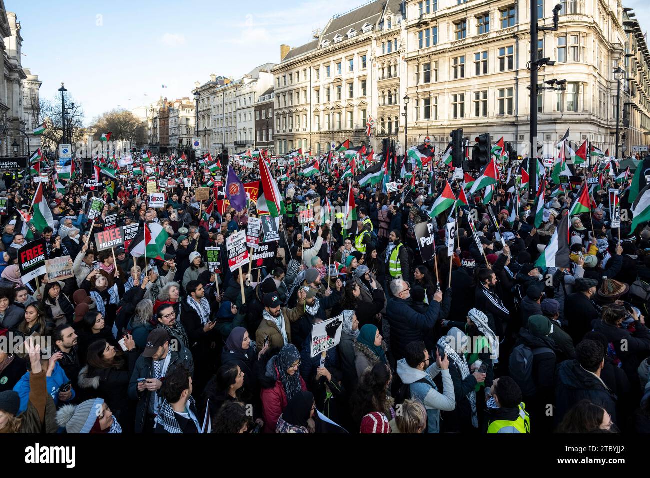 London, UK.  9 December 2023.  People at a rally in Parliament Square during a National March for Palestine in solidarity with the people of Palestine and to demand an immediate ceasefire in the Israel Hamas war which began with Hamas’ attack on Israel on October 7th.  The US has vetoed a UN Security Council ceasefire vote with the UK chose to abstain.    Credit: Stephen Chung / Alamy Live News Stock Photo