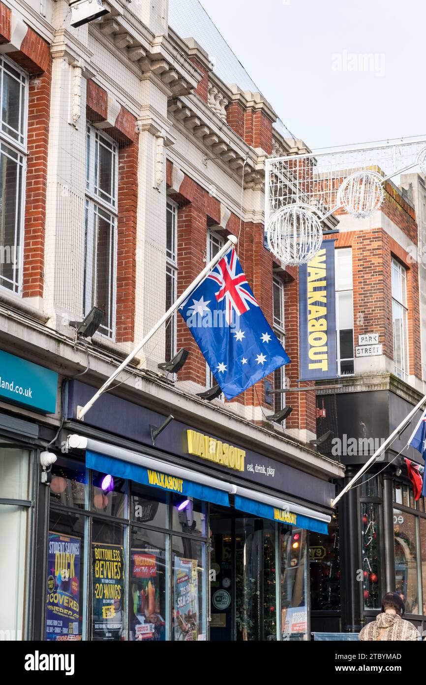 Australian flag flying outside Walkabout bar, High Street, Lincoln City, Lincolnshire, England, UK Stock Photo