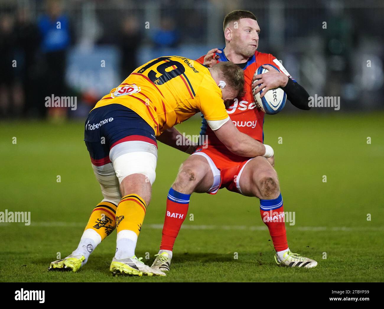 Bath Rugby's Finn Russell (right) tackled by Ulster Rugby's Kieran Treadwell during the Investec