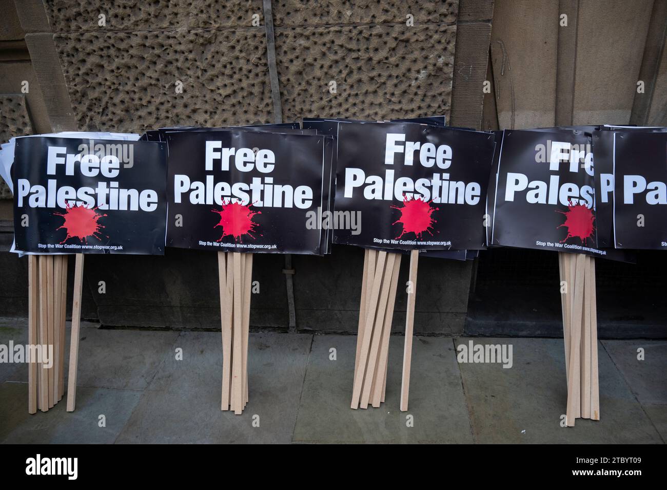 On 9th December 2023 people gather around Bank junction in the City of London to demand a ceasefire in Gaza. 'Free Palestine' placards. Stock Photo