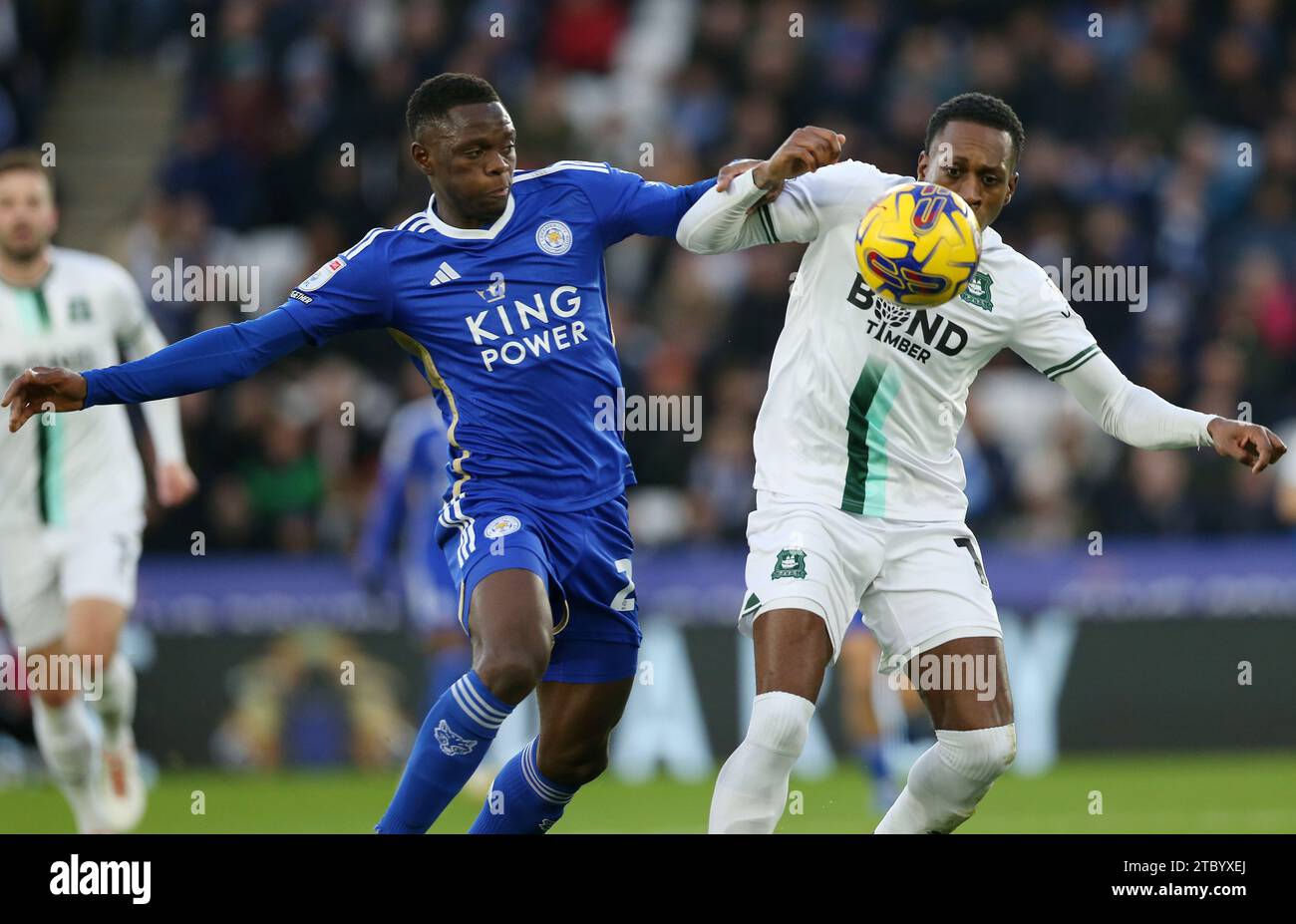 Leicester City's Patson Daka and Plymouth Argyle's Mickel Miller battle for the ball during the Sky Bet Championship match at the King Power Stadium, Leicester. Picture date: Saturday December 9, 2023. Stock Photo