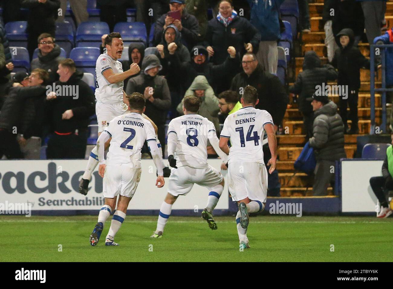 Birkenhead, UK. 09th Dec, 2023. Connor Jennings of Tranmere Rovers (l, jumping) celebrates with his teammates after scoring his teams 2nd goal. EFL Skybet Football league two match, Tranmere Rovers v Newport County at Prenton Park, Birkenhead, Wirral on Saturday 9th December 2023. this image may only be used for Editorial purposes. Editorial use only, .pic by Chris Stading/ Credit: Andrew Orchard sports photography/Alamy Live News Stock Photo