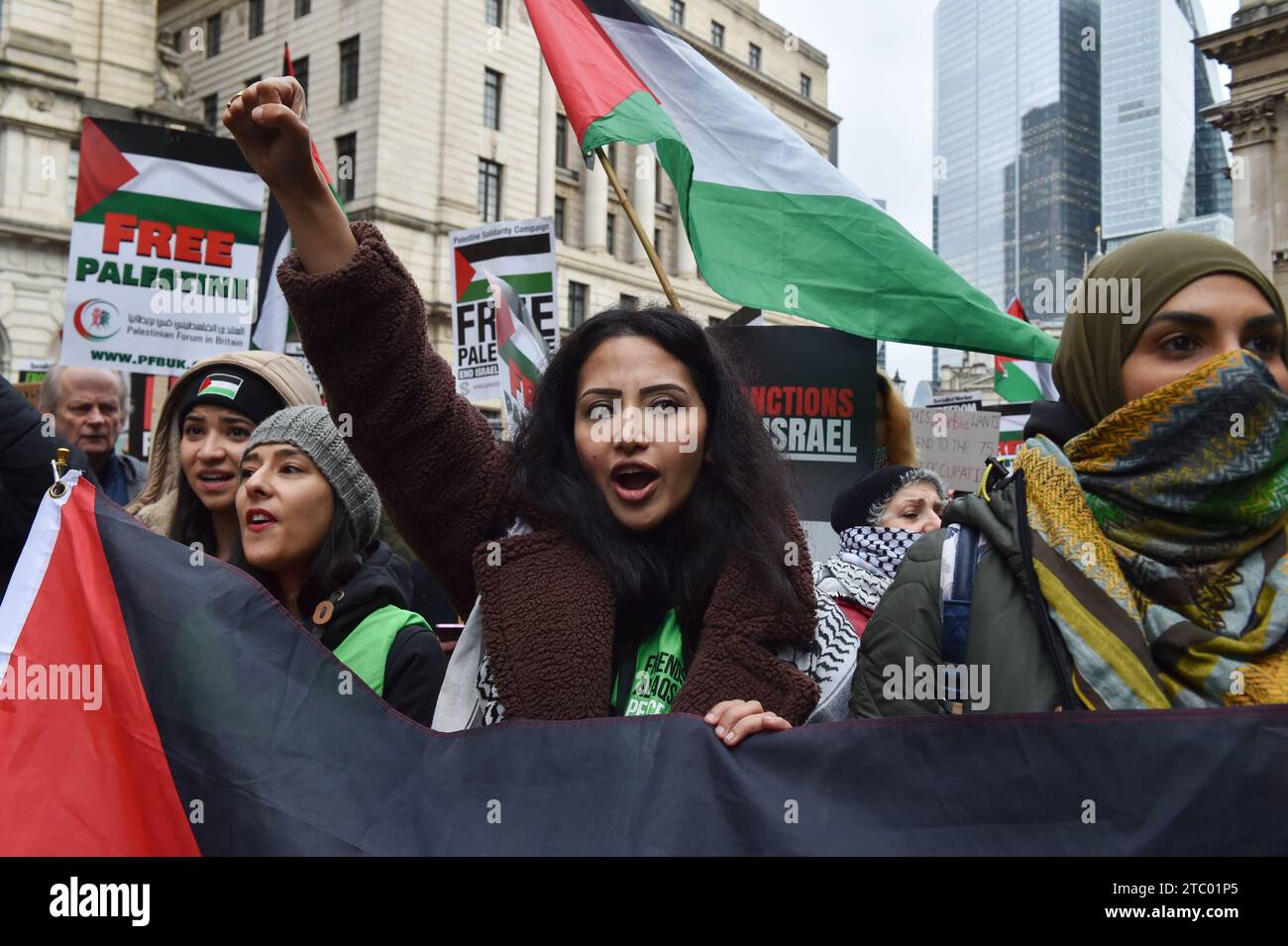 A woman shouts pro-Palestine slogans while participating in a ...