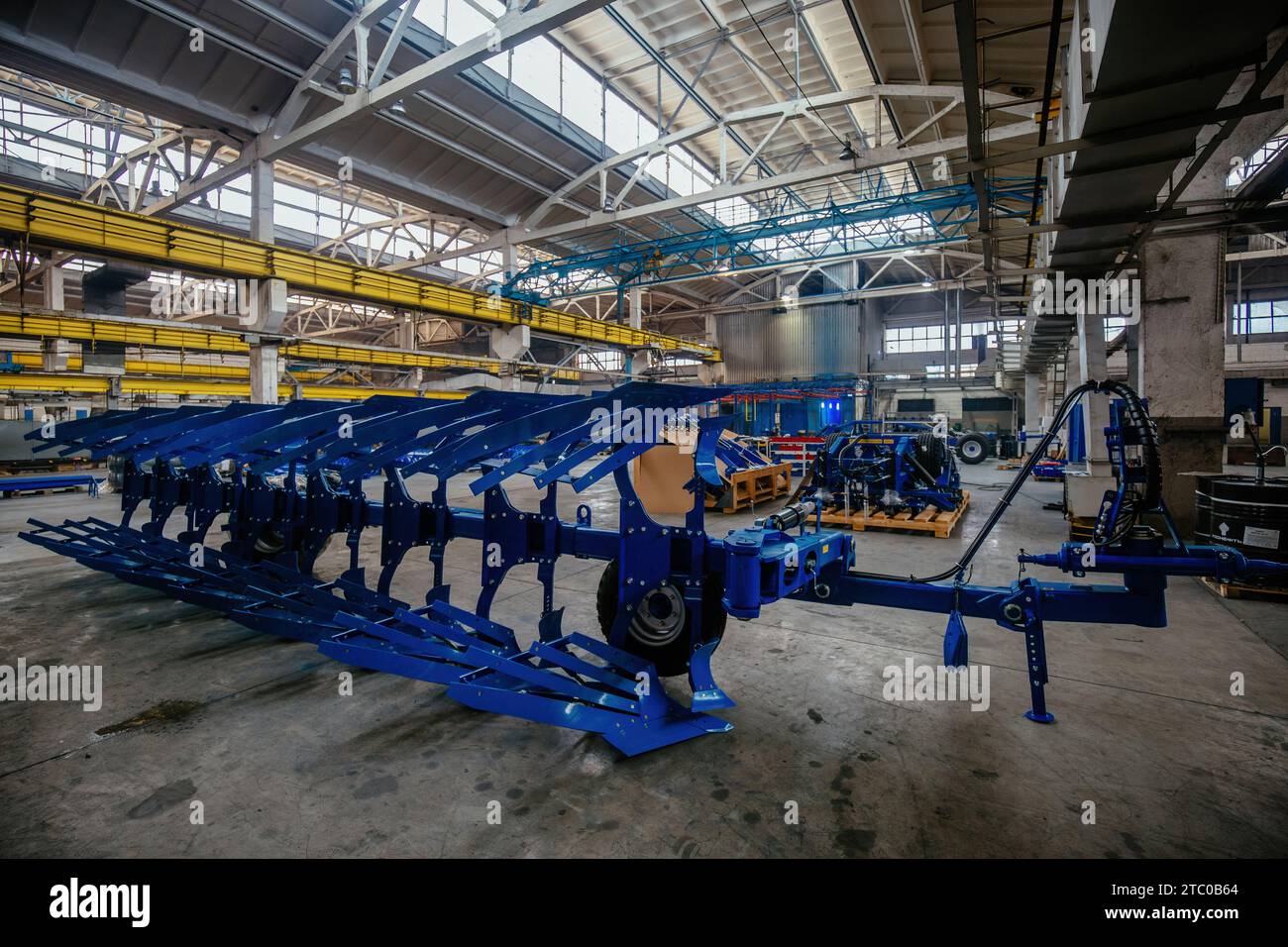 Modern manufactured agricultural reversible plow in factory Stock Photo