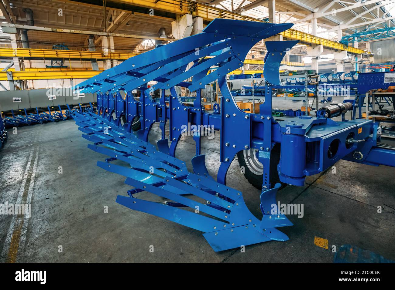 Modern manufactured agricultural reversible plow in factory Stock Photo