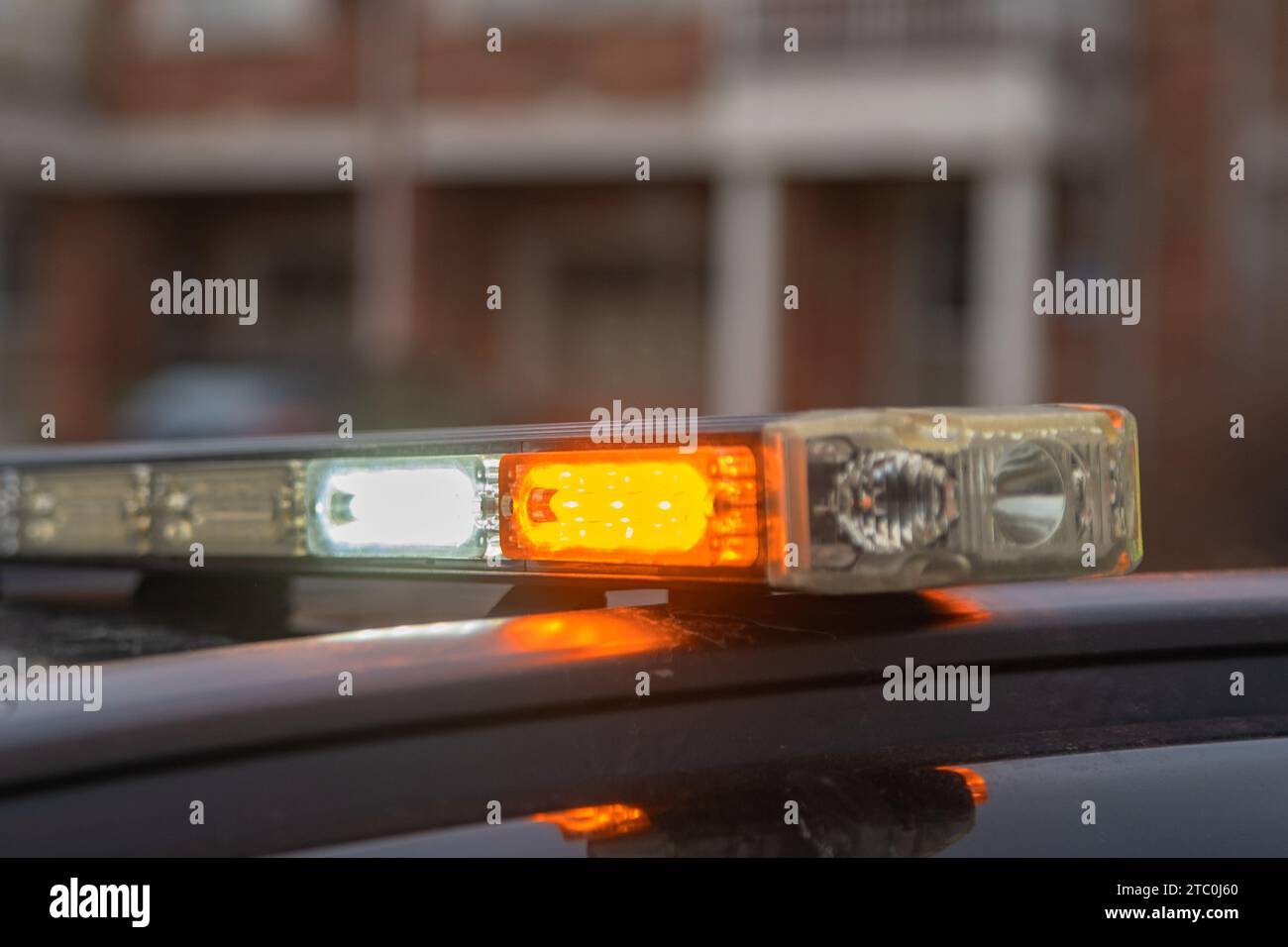 Security guard conducting access control and traffic control around a