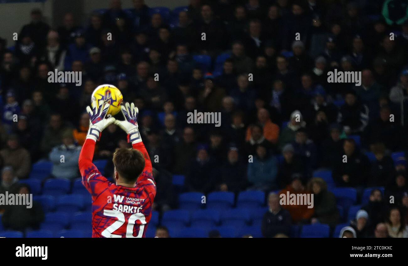 Cardiff, UK. 09th Dec, 2023. Matija Sarkic, the goalkeeper of Millwall makes a save EFL Skybet championship match, Cardiff city v Millwall at the Cardiff City Stadium in Cardiff, Wales on Saturday 9th December 2023. this image may only be used for Editorial purposes. Editorial use only, pic by Andrew Orchard/Andrew Orchard sports photography/Alamy Live news Credit: Andrew Orchard sports photography/Alamy Live News Stock Photo