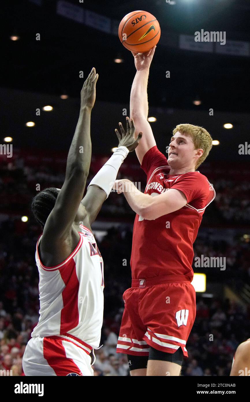 Wisconsin Forward Steven Crowl, Right, Shoots Over Arizona Center Oumar ...