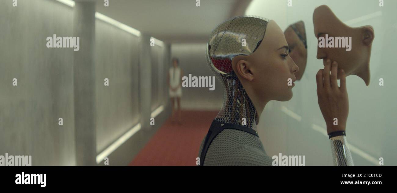 RELEASE DATE: April 24, 2015.TITLE: Ex Machina. STUDIO: Universal Pictures. DIRECTOR: Alex Garland. PLOT: A young programmer is selected to participate in a ground-breaking experiment in synthetic intelligence by evaluating the human qualities of a highly advanced humanoid A.I. STARRING: Alicia Vikander, Domhnall Gleeson, Oscar Isaac. (Credit: © Universal Pictures/Entertainment Pictures/ZUMAPRESS.com) EDITORIAL USAGE ONLY! Not for Commercial USAGE! Stock Photo