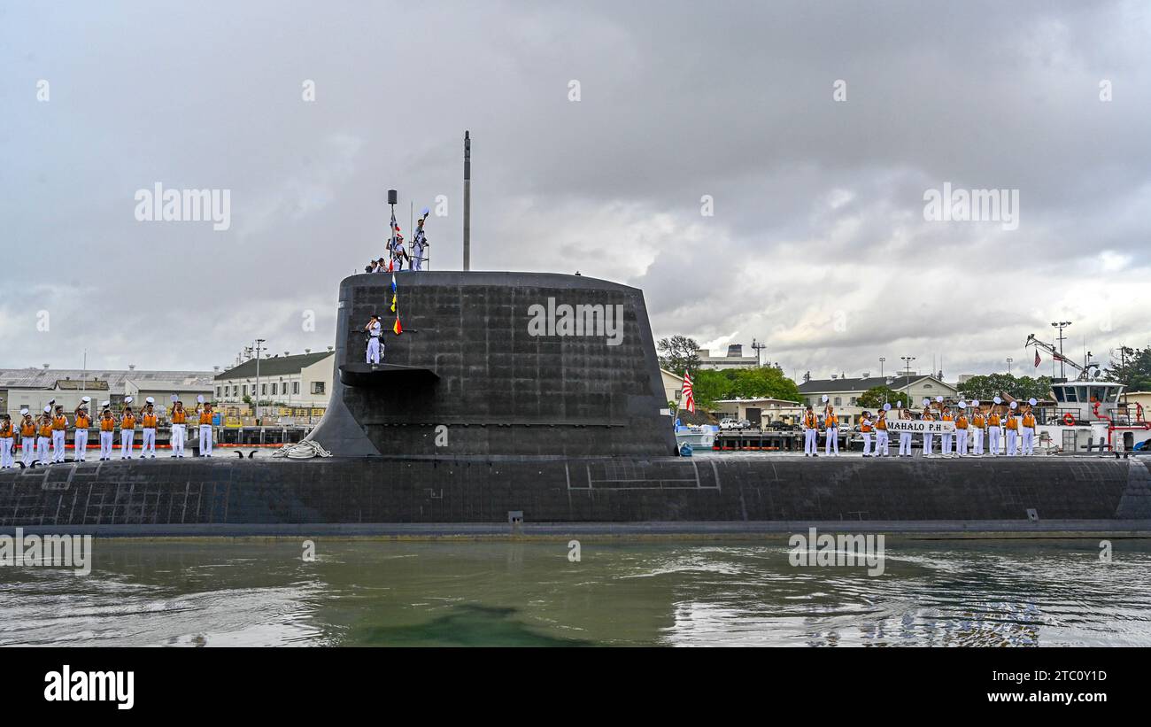 JOINT BASE PEARL HARBOR-HICKAM (Nov. 28, 2023) -- The Japan Maritime Self-Defense Force Soryu-class submarine JS Sekiryu (SS 508) departs Joint Base Pearl Harbor-Hickam, Hawaii, Nov. 28, 2023. The U.S. Pacific Fleet’s Submarine Force welcomes visits by our closest allies to hone our skills together and strengthen our partnerships. The Pacific Submarine Force provides strategic deterrence, anti-submarine warfare, anti-surface warfare, precision land strike, intelligence, surveillance, reconnaissance, early warning, and special warfare capabilities around the globe. (U.S. Navy photo by Lorilyn C Stock Photo