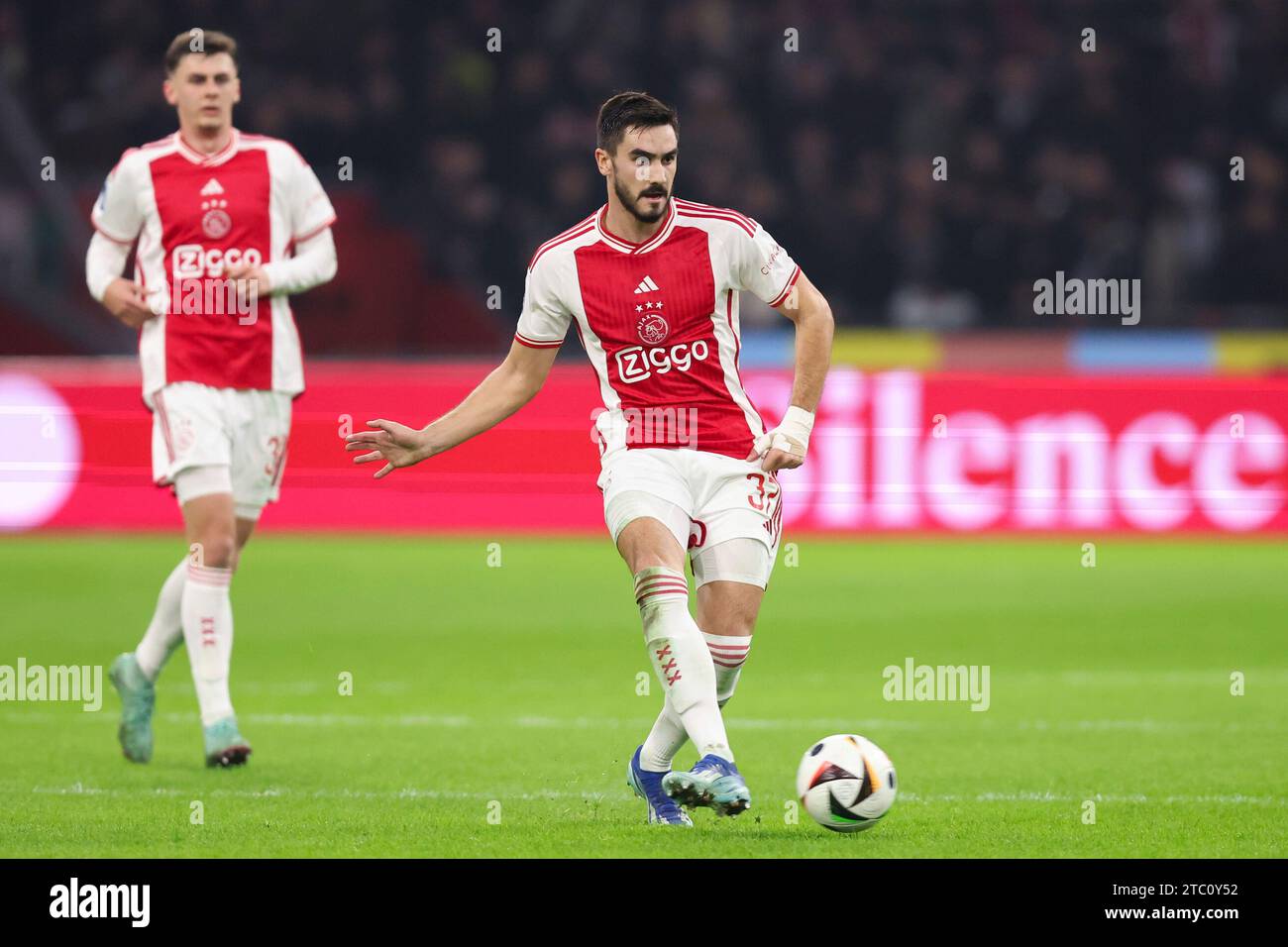 Amsterdam, Niederlande. 09th Dec, 2023. Josip Sutalo of Ajax passes the ball during the Dutch Eredivisie match between Ajax and Sparta on December 9, 2023 in Amsterdam, Netherlands Credit: dpa/Alamy Live News Stock Photo