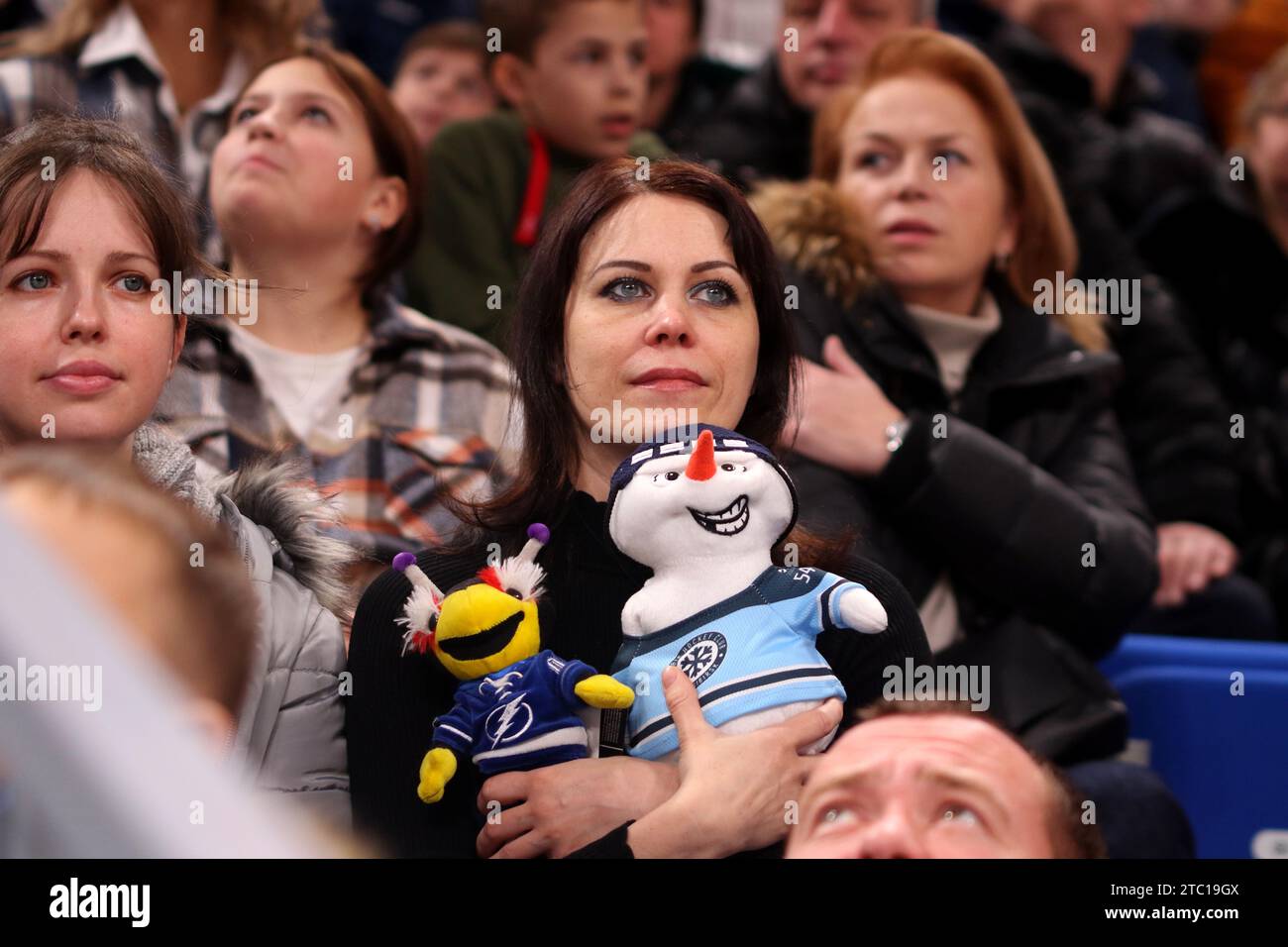 Saint Petersburg, Russia. 09th Dec, 2023. A girl, a spectator holds team mascots at the 2023 Kontinental Hockey League All-Star Game on the first day of competition at the SKA Arena in St. Petersburg, Russia. (Photo by Maksim Konstantinov/SOPA Images/Sipa USA) Credit: Sipa USA/Alamy Live News Stock Photo