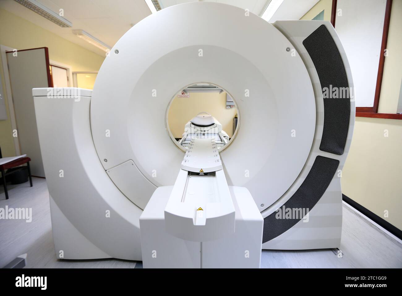 File photo dated 15/08/14 of a CT scanner. Action should be taken to