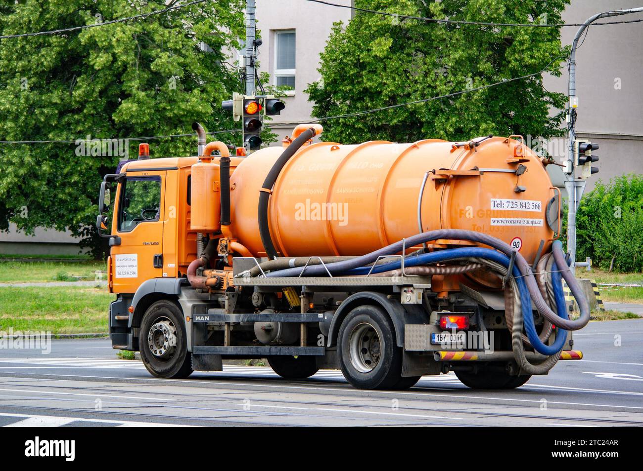 HAVIROV, CZECH REPUBLIC - JUNE 26, 2022: Orange TGM 18.250 cleaning truck on a street in Ostrava streets Stock Photo