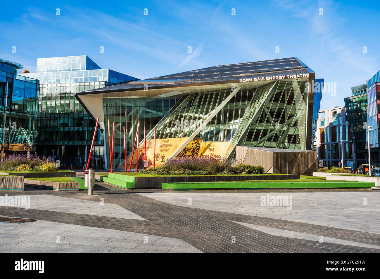 Grand Canal Square, with red resin-glass paving  with red glowing angled light sticks, in the Southside area, Dublin's Docklands, Ireland. Stock Photo