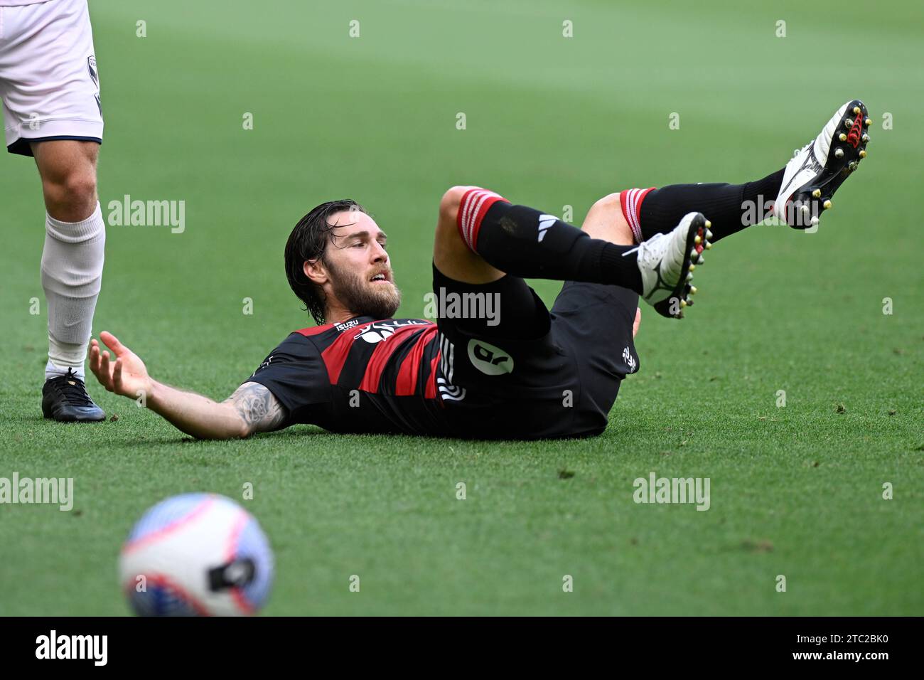 10th December 2023;  CommBank Stadium, Sydney, NSW, Australia: A-League Football, Western Sydney Wanderers versus Melbourne Victory; Joshua Brillante of Western Sydney Wanderers goes to the ground after a tackle Stock Photo