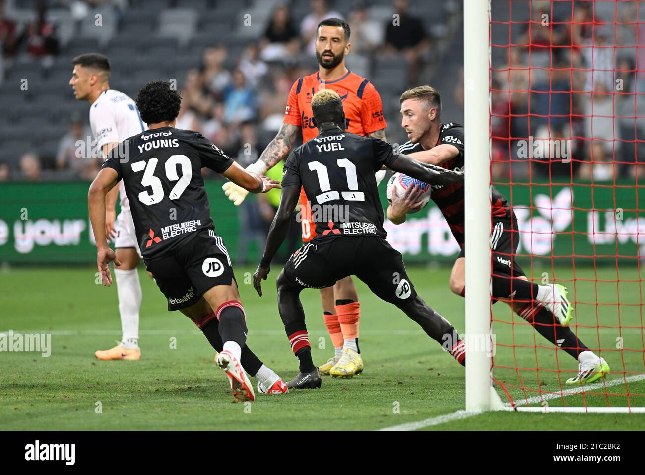 10th December 2023;  CommBank Stadium, Sydney, NSW, Australia: A-League Football, Western Sydney Wanderers versus Melbourne Victory; Tom Beadling of Western Sydney Wanderers retrieves the ball after Valentino Yuel of Western Sydney Wanderers scores in the 91st minute to make it 4-3 Stock Photo