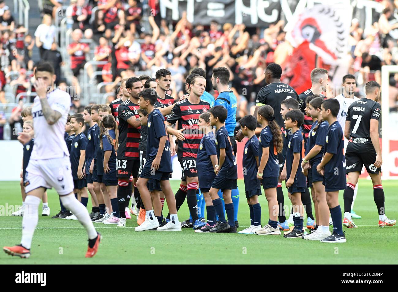 10th December 2023;  CommBank Stadium, Sydney, NSW, Australia: A-League Football, Western Sydney Wanderers versus Melbourne Victory; the teams shake hands with before kick off Stock Photo