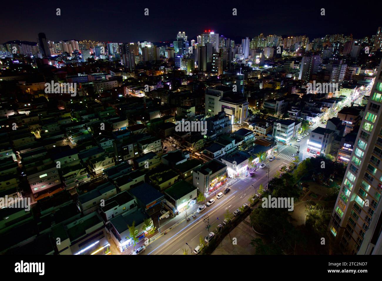 Captured from the 24th story of an apartment, this image showcases Ulsan's city streets at night