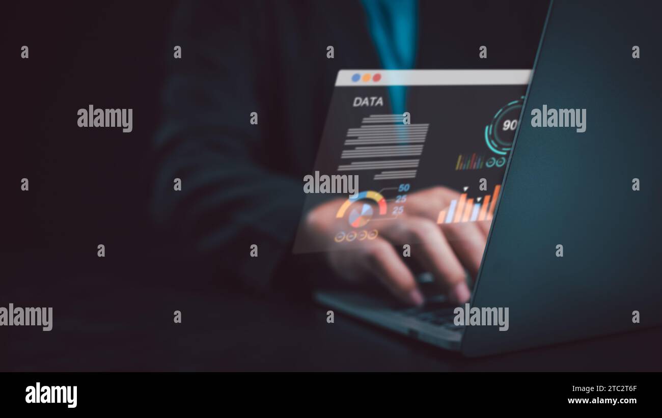 Business people use computers to analyze business and manage corporate ...