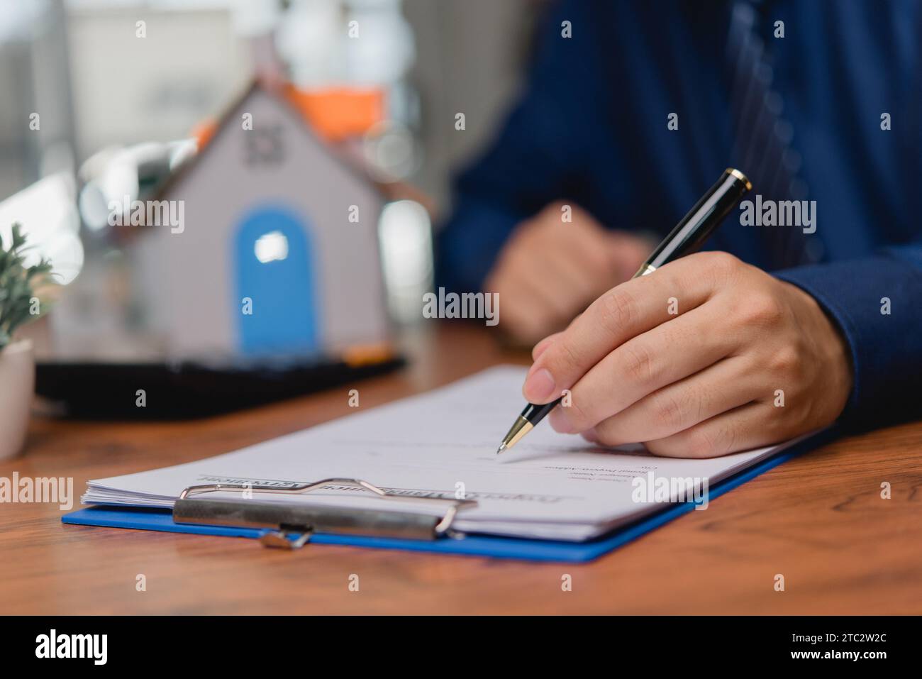 Business person Writing contract law and paper work for business and ...