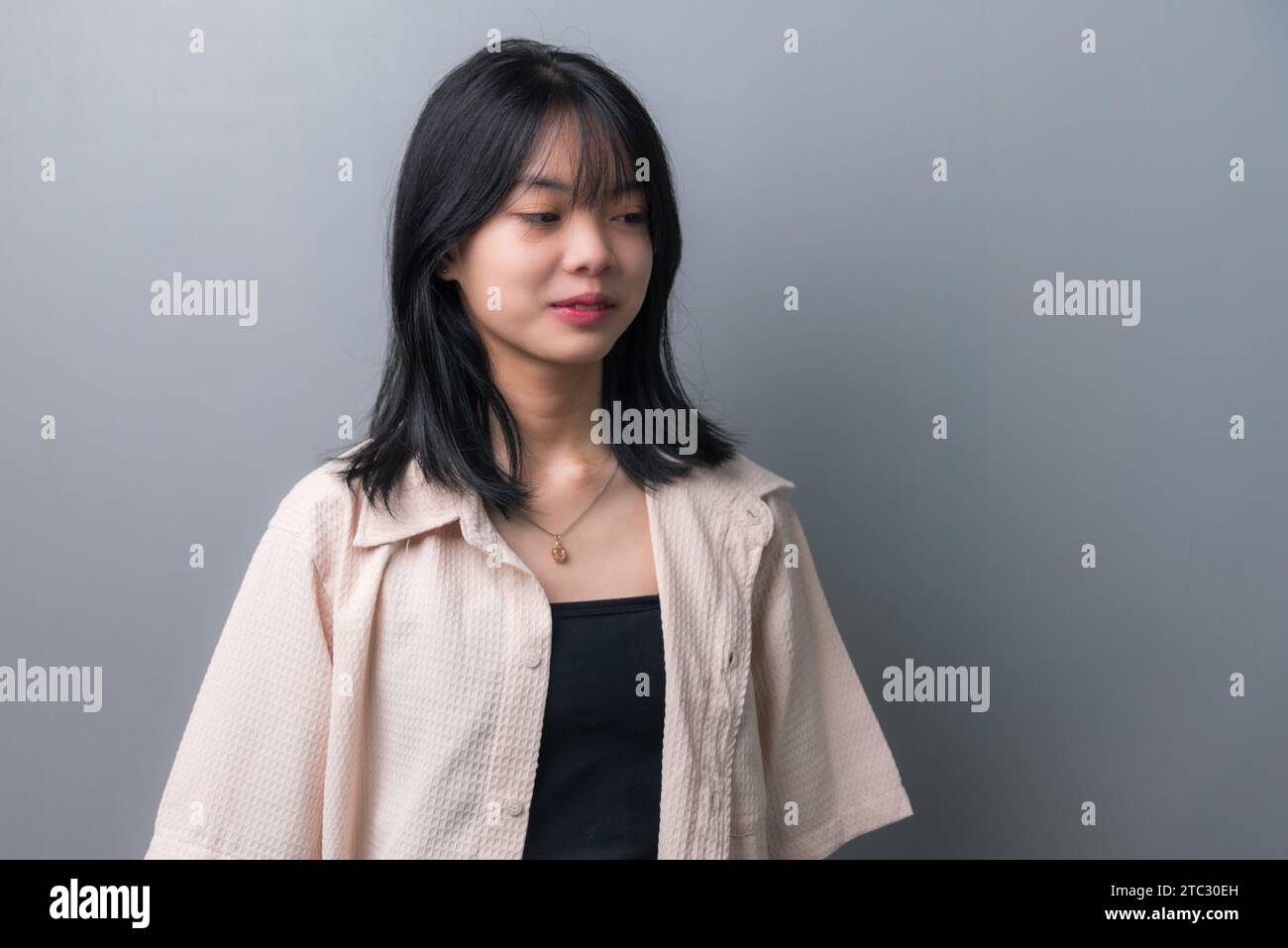 Happy Asian Teen Girl in Closeup Portrait on background Stock Photo - Alamy