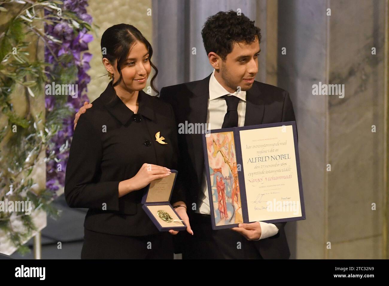 Oslo, Norway. 10th Dec, 2023. Ali Rahmani and Kiana Rahmani attend The Nobel Peace Prize ceremony for Iranian activist Narges Mohammadi at the Nobel Institute in Oslo, Norway. 2023 Nobel Peace Prize winner Narges Mohammadi is imprisoned and is therefore represented by her family. Mohammadi receives the peace prize for her fight against the oppression of women in Iran and the fight for human rights and freedom for all. December 10, 2023. Photo by Paul Treadway/ Credit: UPI/Alamy Live News Stock Photo