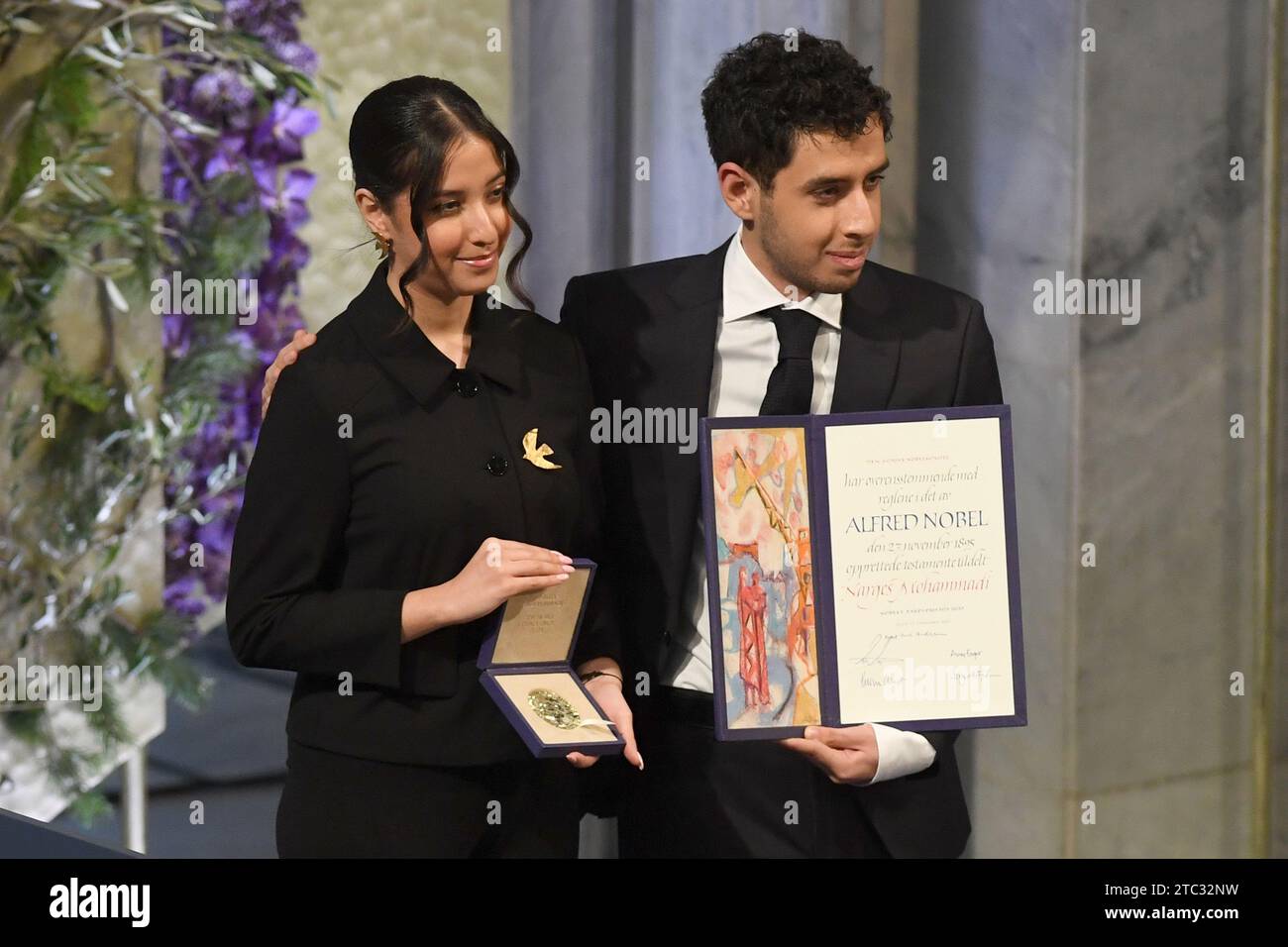 Oslo, Norway. 10th Dec, 2023. Ali Rahmani and Kiana Rahmani attend The Nobel Peace Prize ceremony for Iranian activist Narges Mohammadi at the Nobel Institute in Oslo, Norway. 2023 Nobel Peace Prize winner Narges Mohammadi is imprisoned and is therefore represented by her family. Mohammadi receives the peace prize for her fight against the oppression of women in Iran and the fight for human rights and freedom for all. December 10, 2023. Photo by Paul Treadway/ Credit: UPI/Alamy Live News Stock Photo