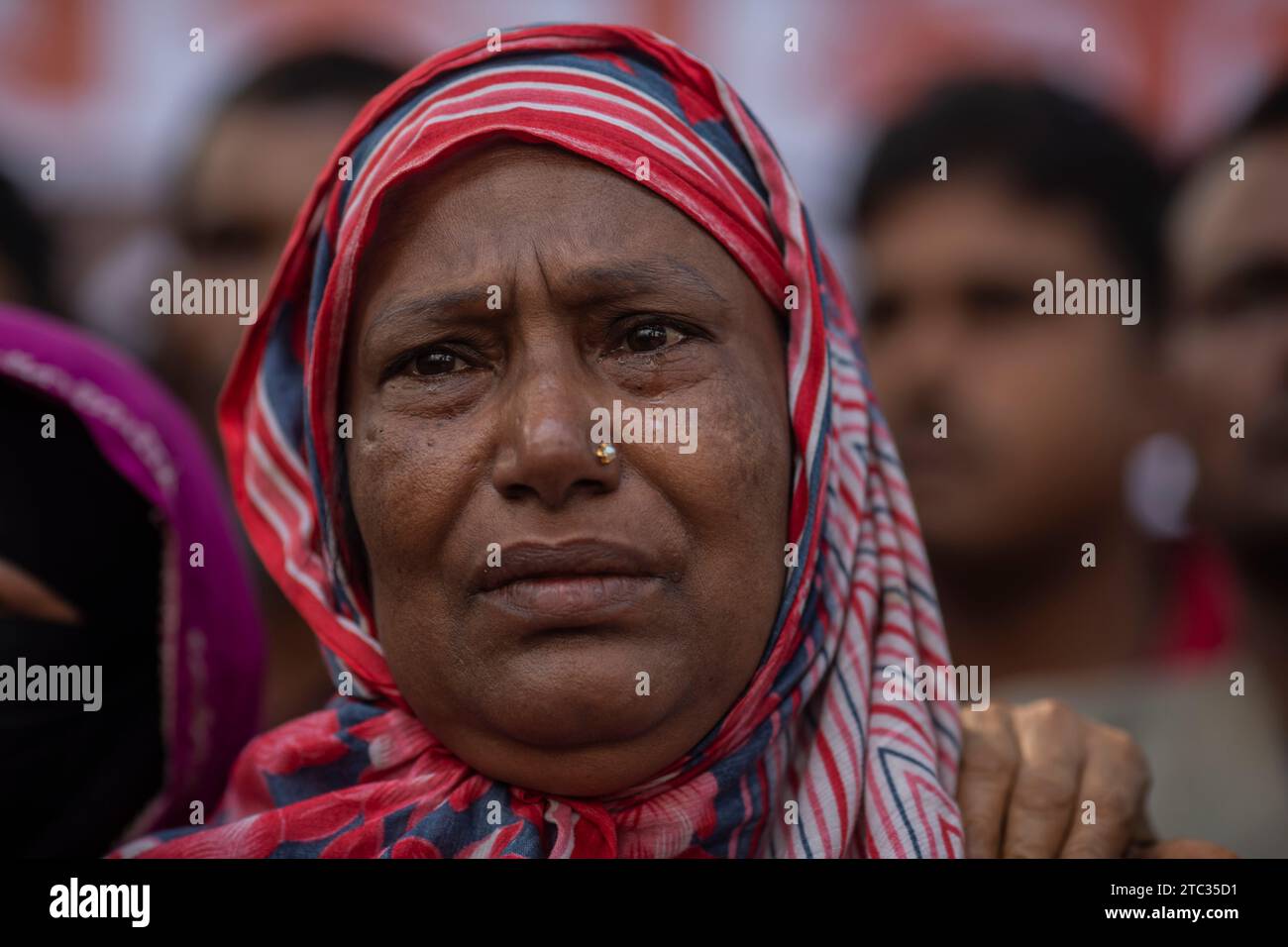 A woman seen crying for her missing son during the international Human