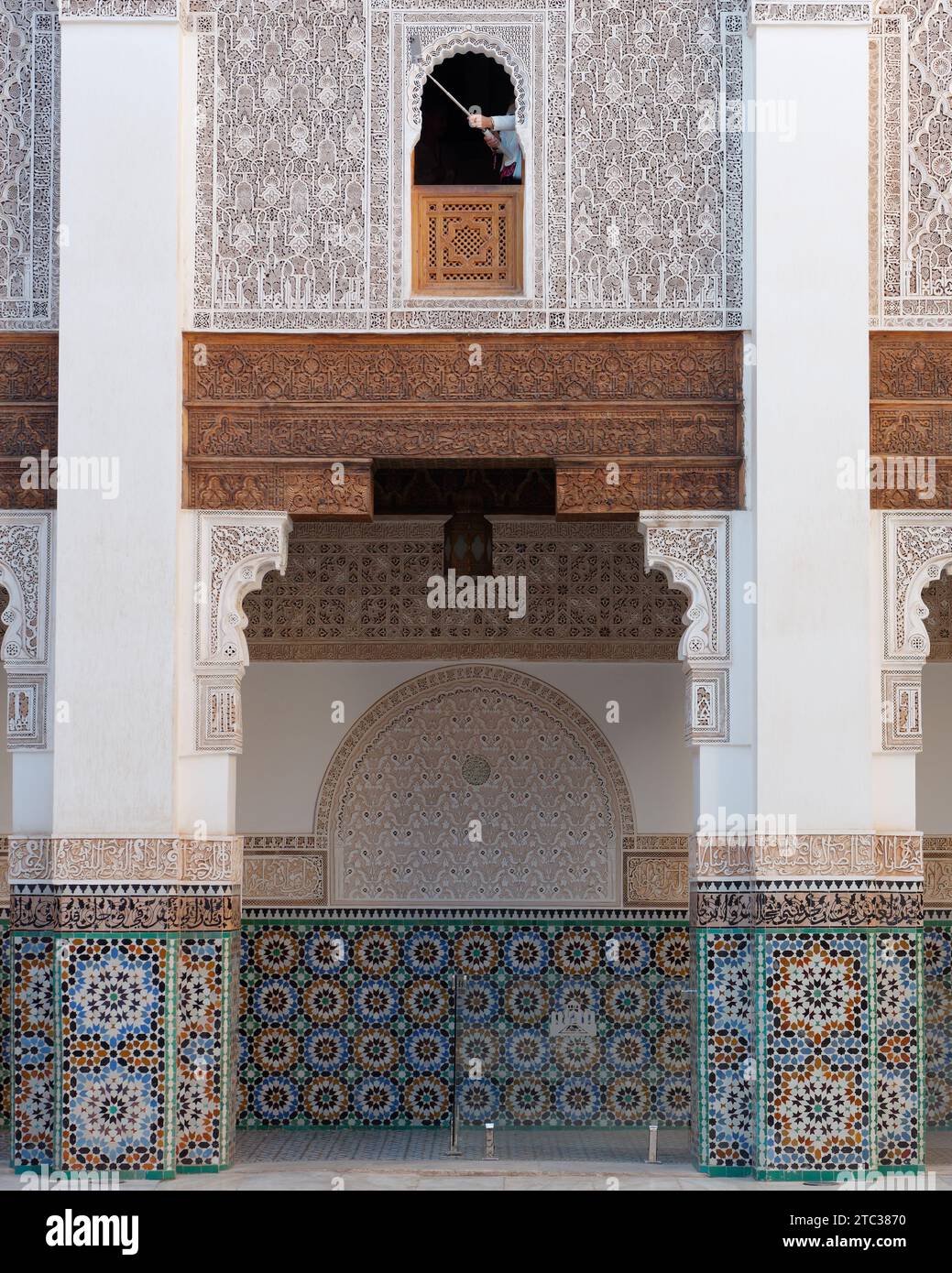 Main courtyard at Ben Youssef Medersa historic Islamic school/college Marrakesh aka Marrakech with Mosque in the distance, Morocco, December 10, 2023 Stock Photo