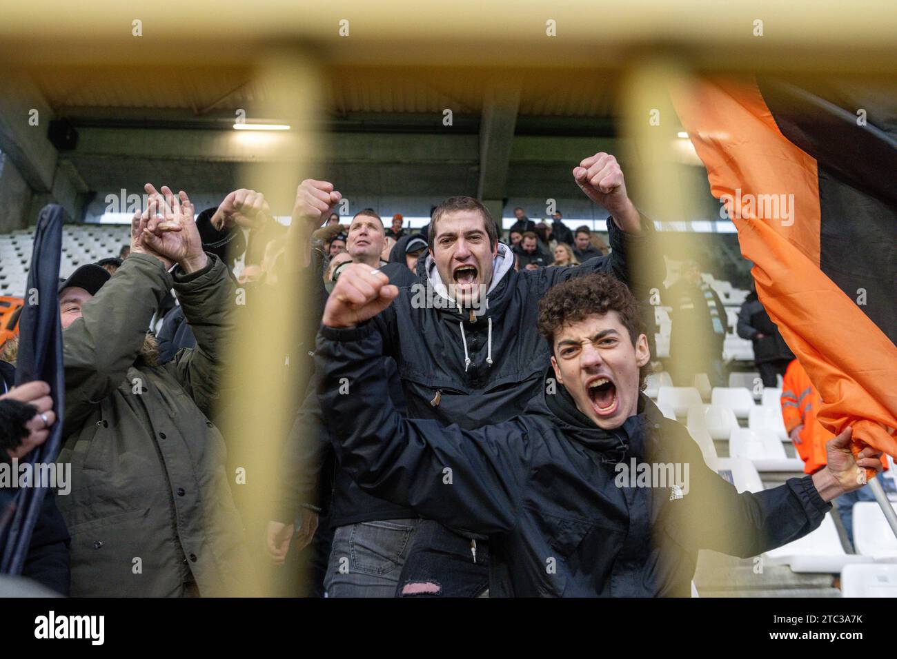 Supporters Deinze pictured after a soccer game between Beerschot and KMSK Deinze during the 15th matchday in the Challenger Pro League 2023-2024 season , on  Sunday 10 December 2023  in Deinze , Belgium . PHOTO SPORTPIX | Stijn Audooren Stock Photo