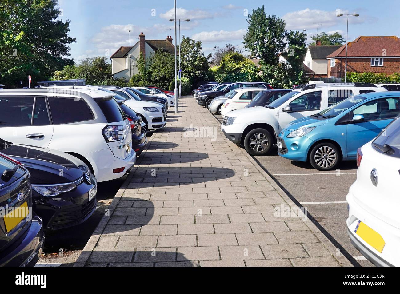 Billericay Essex car park behind shopping High Street cars in parking bays beside path pay & display operated by Basildon Council England UK Stock Photo
