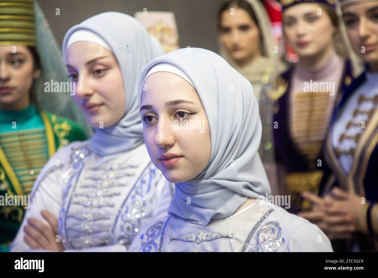 Moscow, Russia. 10th of December, 2023. Women wearing traditional costumes are seen at the opening of Chechen Republic Day during the Russia Expo international exhibition and forum at the VDNKh exhibition centre in Moscow, Russia. Credit: Nikolay Vinokurov/Alamy Live News Stock Photo