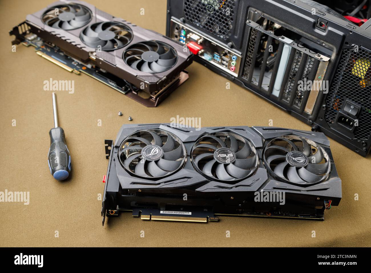 graphics card upgrading concept, two gaming graphics cards near desktop
