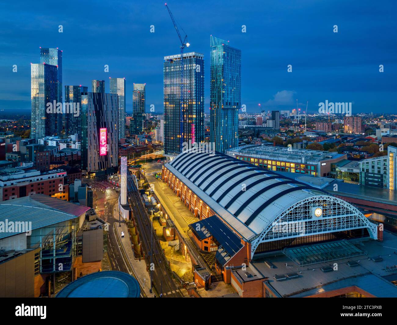 Manchester City Centre skyline at dawn with city lights and dark skies of this English city. Beetham Tower and Manchester central skyline. united king Stock Photo