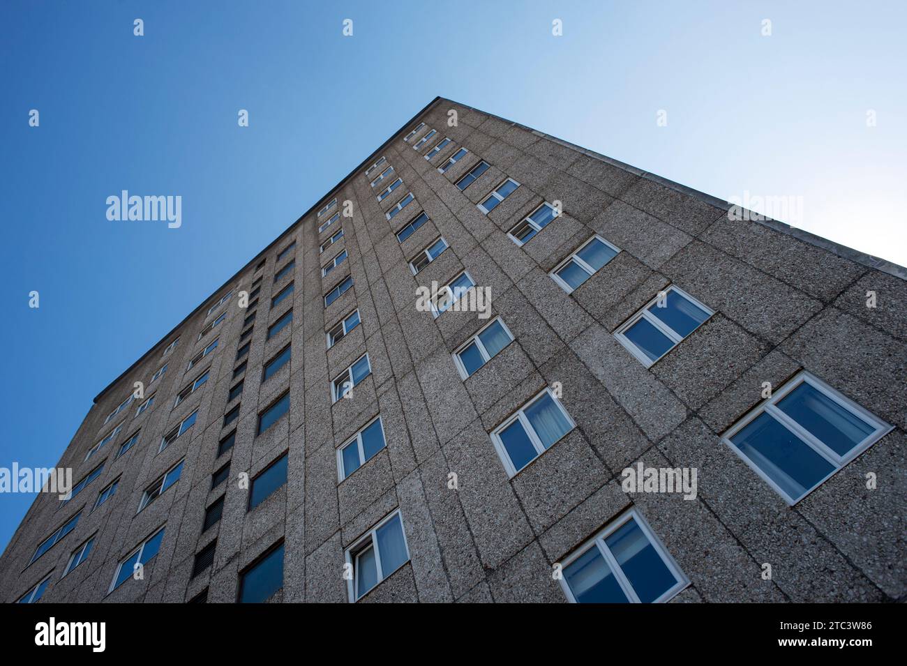 apartment building, brutalist architecture, pebbledash cladding Stock