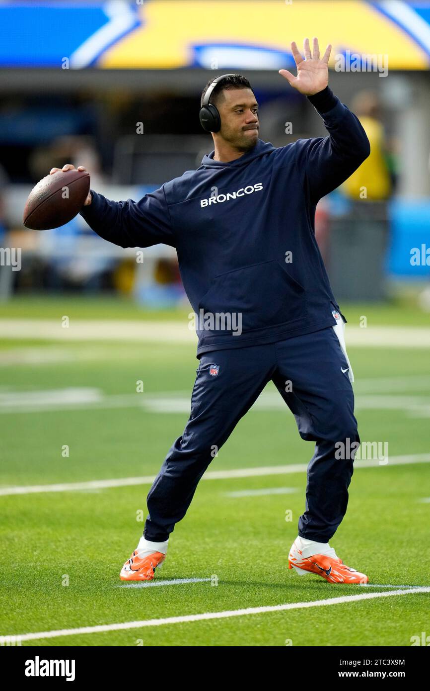 Denver Broncos quarterback Russell Wilson warms up before the team's ...