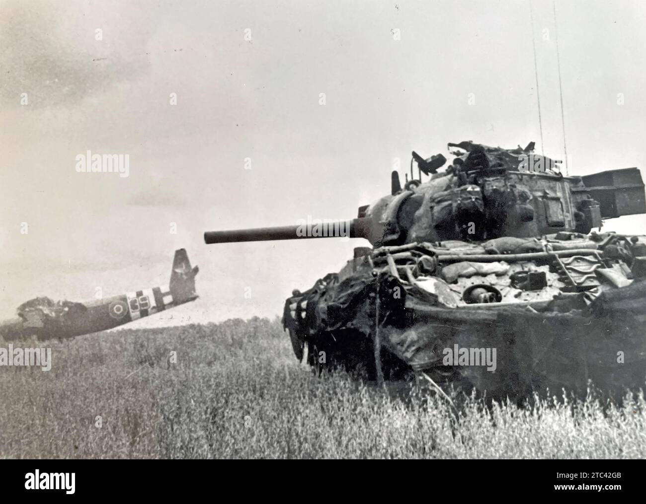 NORMANDY LANDINGS June 1944. A Sherman tank in open country near a Waco glider Stock Photo Alamy
