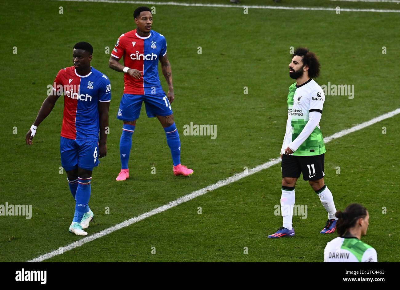 LONDON, ENGLAND - DECEMBER 9: Mohamed Salah, Marc Guehi, Nathaniel Clyne during the Premier League match between Crystal Palace and Liverpool FC at Se Stock Photo