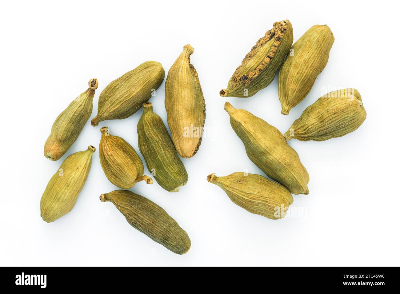 Top view of whole green cardamom pods on white background Stock Photo