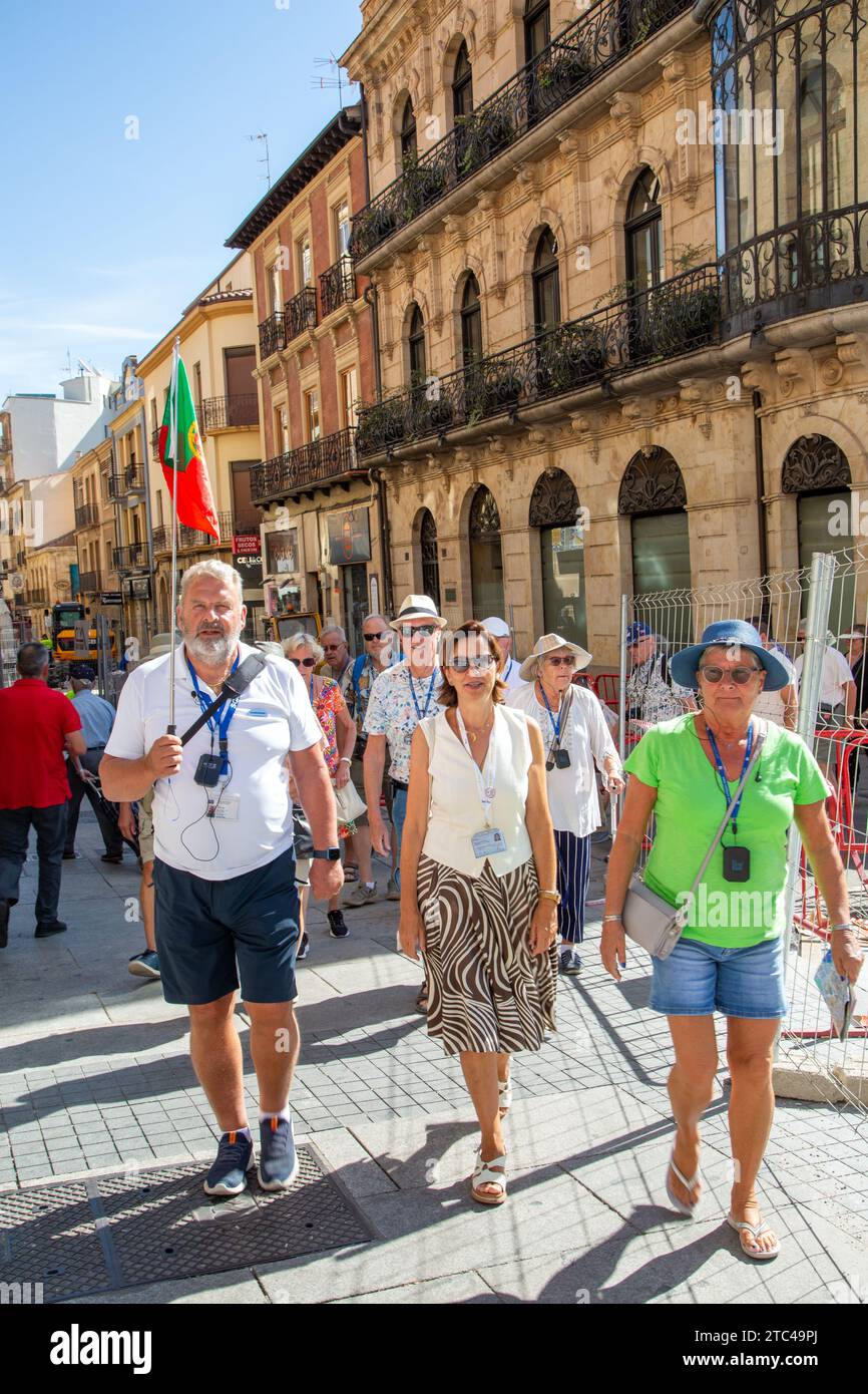 Tourists on a guided walking tour in the Spanish city of Salamanca