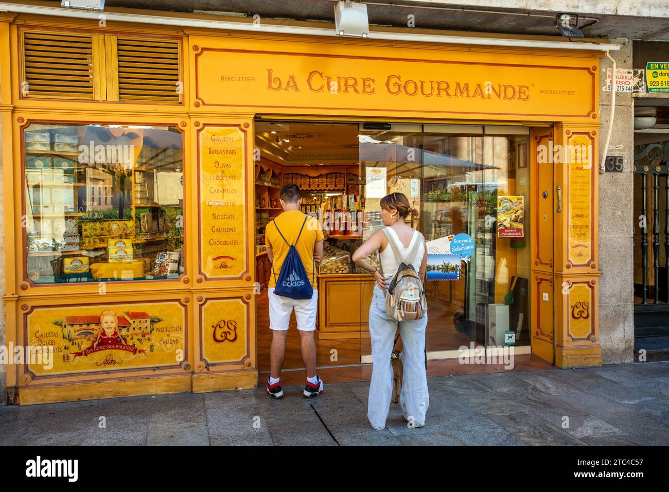 Tourists in the Spanish city of Salamanca Spain buying goods at a