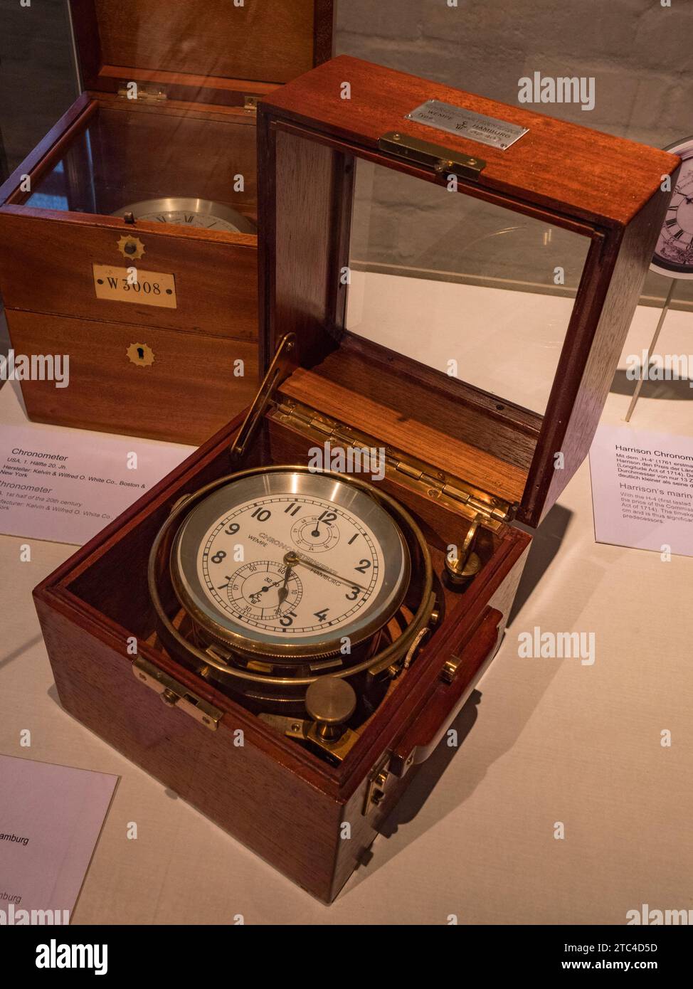 A dry compass with bearing attachment gimballed in its wooden box (Portugal, 1783) , International Maritime Museum in HafenCity, Hamburg, Germany. Stock Photo