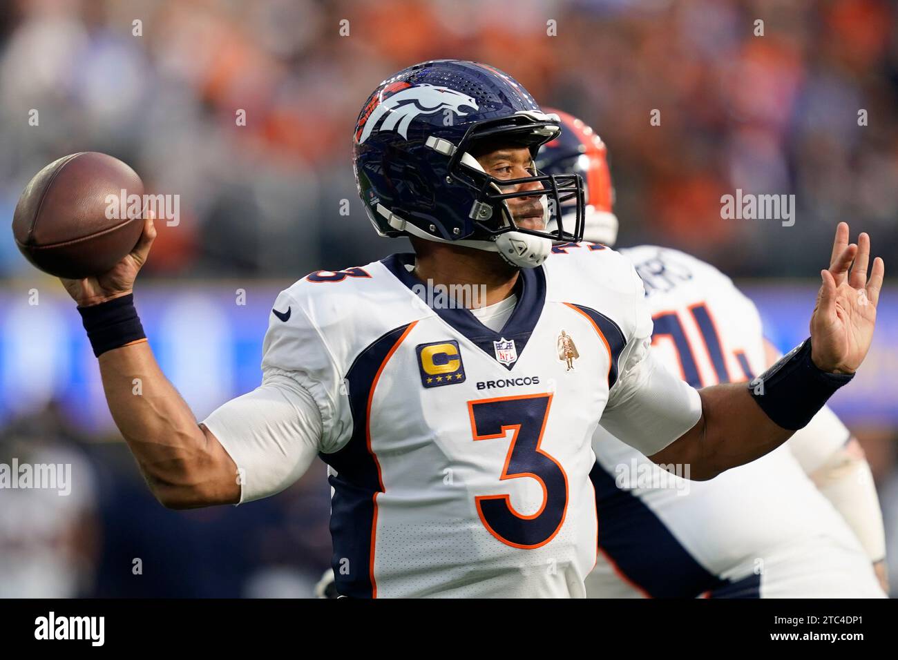 Denver Broncos quarterback Russell Wilson passes during the first half ...